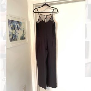 4/$20 black lace jumpsuit with open back